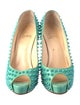 Christian Louboutin Spike Accents Patent Leather Pumps