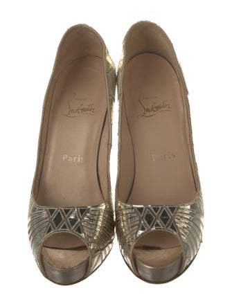 Christian Louboutin Patent Leather Animal Print Pumps