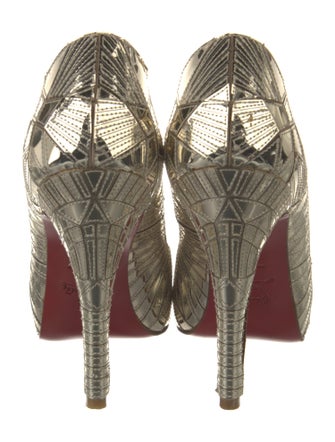Christian Louboutin Patent Leather Animal Print Pumps