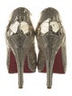 Christian Louboutin Patent Leather Animal Print Pumps