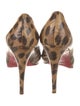 Christian Louboutin Patent Leather Animal Print Pumps