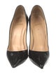 Christian Louboutin Patent Leather Pumps
