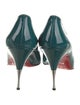 Christian Louboutin Patent Leather Pumps