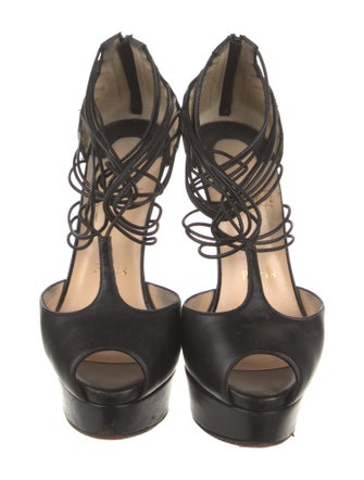 Christian Louboutin Leather T-Strap Pumps