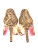 Christian Louboutin Snakeskin Animal Print Pumps