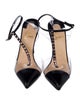 Christian Louboutin Patent Leather T-Strap Pumps