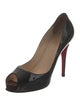 Christian Louboutin Patent Leather Pumps