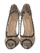 Christian Louboutin PVC Animal Print Pumps