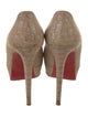 Christian Louboutin Embossed Leather Animal Print Pumps