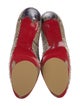 Christian Louboutin Snakeskin Animal Print Pumps