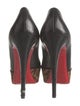 Christian Louboutin Leather Animal Print Pumps