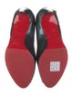 Christian Louboutin Patent Leather Pumps