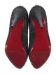 Christian Louboutin Python Pumps