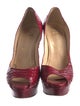 Christian Louboutin Python Pumps