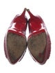 Christian Louboutin Python Pumps