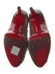 Christian Louboutin Patent Leather Pumps