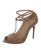 Christian Louboutin Patent Leather T-Strap Pumps