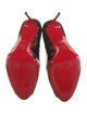 Christian Louboutin Patent Leather Pumps