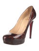 Christian Louboutin Patent Leather Animal Print Pumps