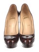 Christian Louboutin Patent Leather Animal Print Pumps