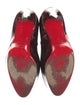 Christian Louboutin Patent Leather Animal Print Pumps