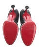 Christian Louboutin Patent Leather Pumps