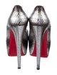 Christian Louboutin Snakeskin Animal Print Pumps