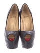 Christian Louboutin Snakeskin Animal Print Pumps
