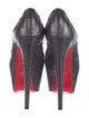 Christian Louboutin Snakeskin Animal Print Pumps