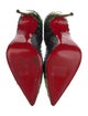 Christian Louboutin Leather Animal Print Pumps