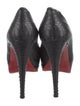 Christian Louboutin Snakeskin Animal Print Pumps