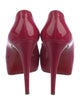 Christian Louboutin Patent Leather Pumps