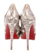 Christian Louboutin Snakeskin Animal Print Pumps