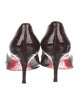 Christian Louboutin Patent Leather Pumps