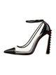 Christian Louboutin Patent Leather Pumps
