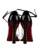 Christian Louboutin Patent Leather Pumps