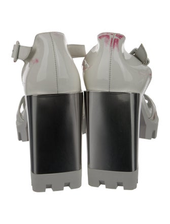 Christian Louboutin Patent Leather T-Strap Pumps