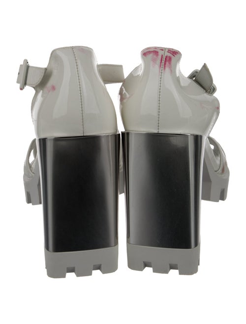 Christian Louboutin Patent Leather T-Strap Pumps