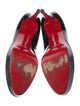 Christian Louboutin Patent Leather Pumps