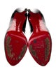 Christian Louboutin Patent Leather Pumps