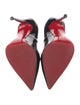 Christian Louboutin Patent Leather Pumps