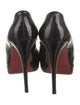 Christian Louboutin Patent Leather Pumps