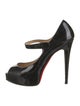 Christian Louboutin Patent Leather Pumps