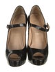 Christian Louboutin Patent Leather Pumps