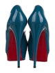 Christian Louboutin Patent Leather Pumps