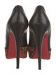 Christian Louboutin Leather Animal Print Pumps
