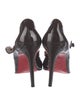 Christian Louboutin Patent Leather Pumps