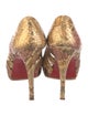 Christian Louboutin Snakeskin Animal Print Pumps