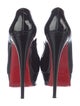 Christian Louboutin Patent Leather Pumps