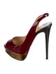 Christian Louboutin Patent Leather Slingback Pumps